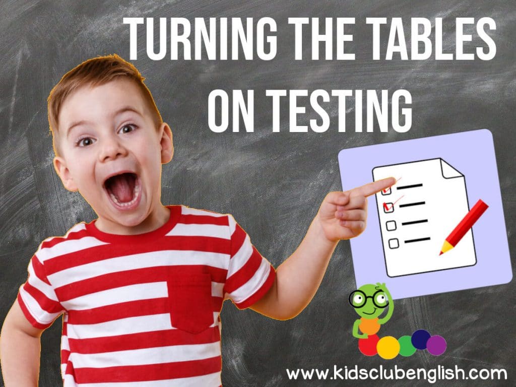 Image of a surprised happy boy acting like a teacher in from of the blackboard. He is pointing at a test. Text says 'turning the tables on testing