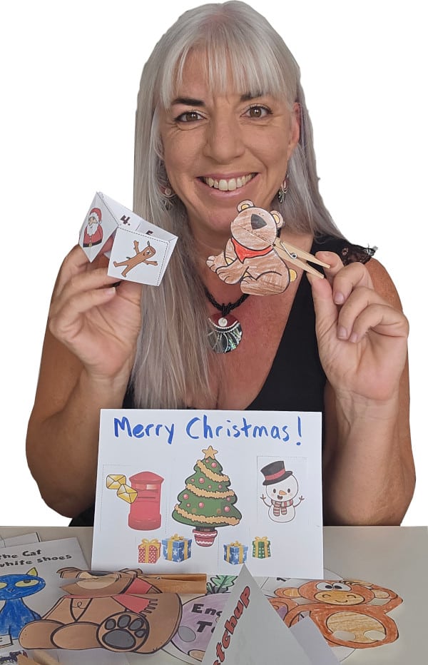 Fiona Hunter holding crafts that she has made and smiling at camera